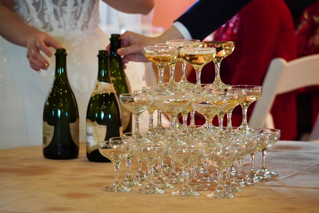 Champagne flutes lined up on a table