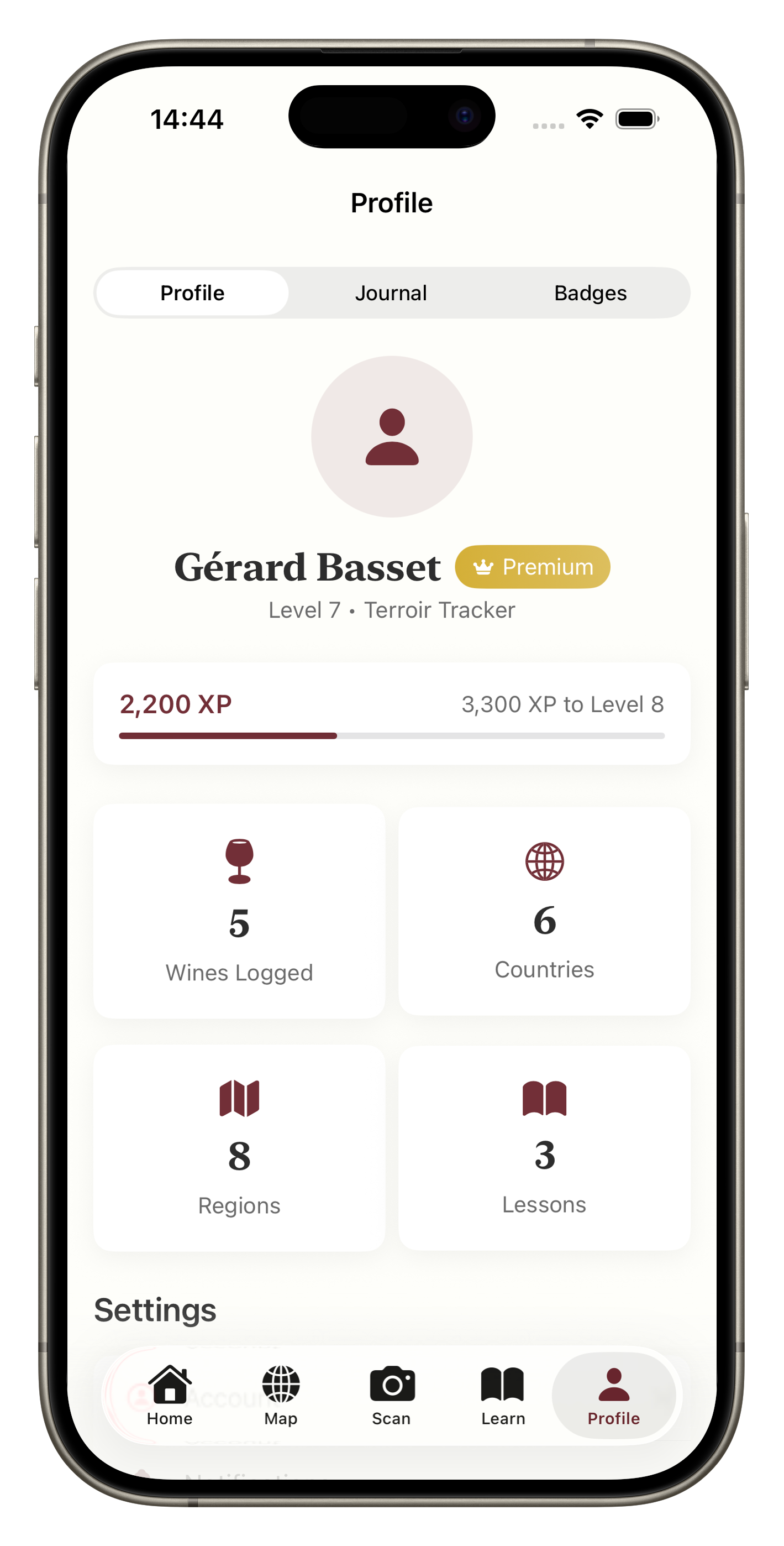 Profile showing level progress, badges, and wine statistics