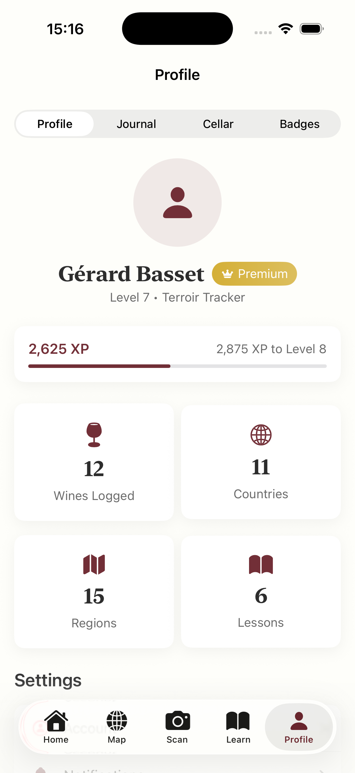 Profile showing level progress, badges, and wine statistics